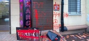 За издевательства над свиньей: в Одессе разгромили фасад тату-салона