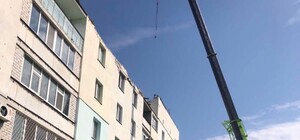 У Немишлянському районі Харкова ремонтують багатоповерхівку, пошкоджену обстрілами росіян