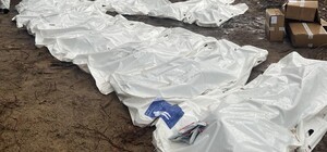 Масове поховання в Ізюмі: куди дзвонити родичам загиблих