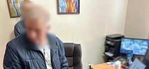 Работник музея 