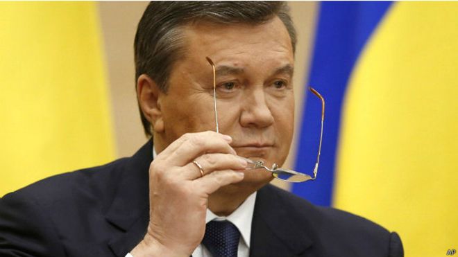 Янукович все еще думает, что он президент Украины/Associated Press