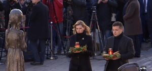 Найди отличия: к приезду президента памятник жертвам Голодомора очистили от цветов